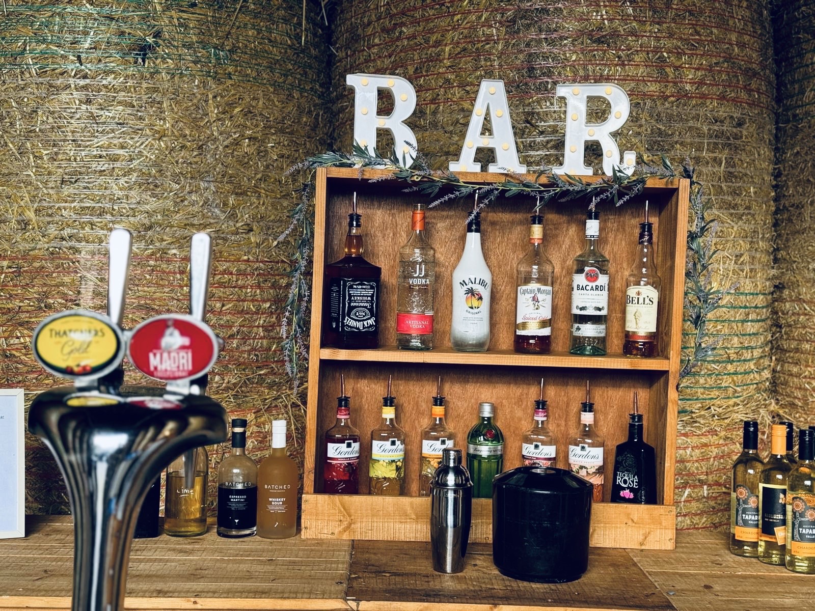 Elevate Your Event with Our Rustic Indoor Bar Experience