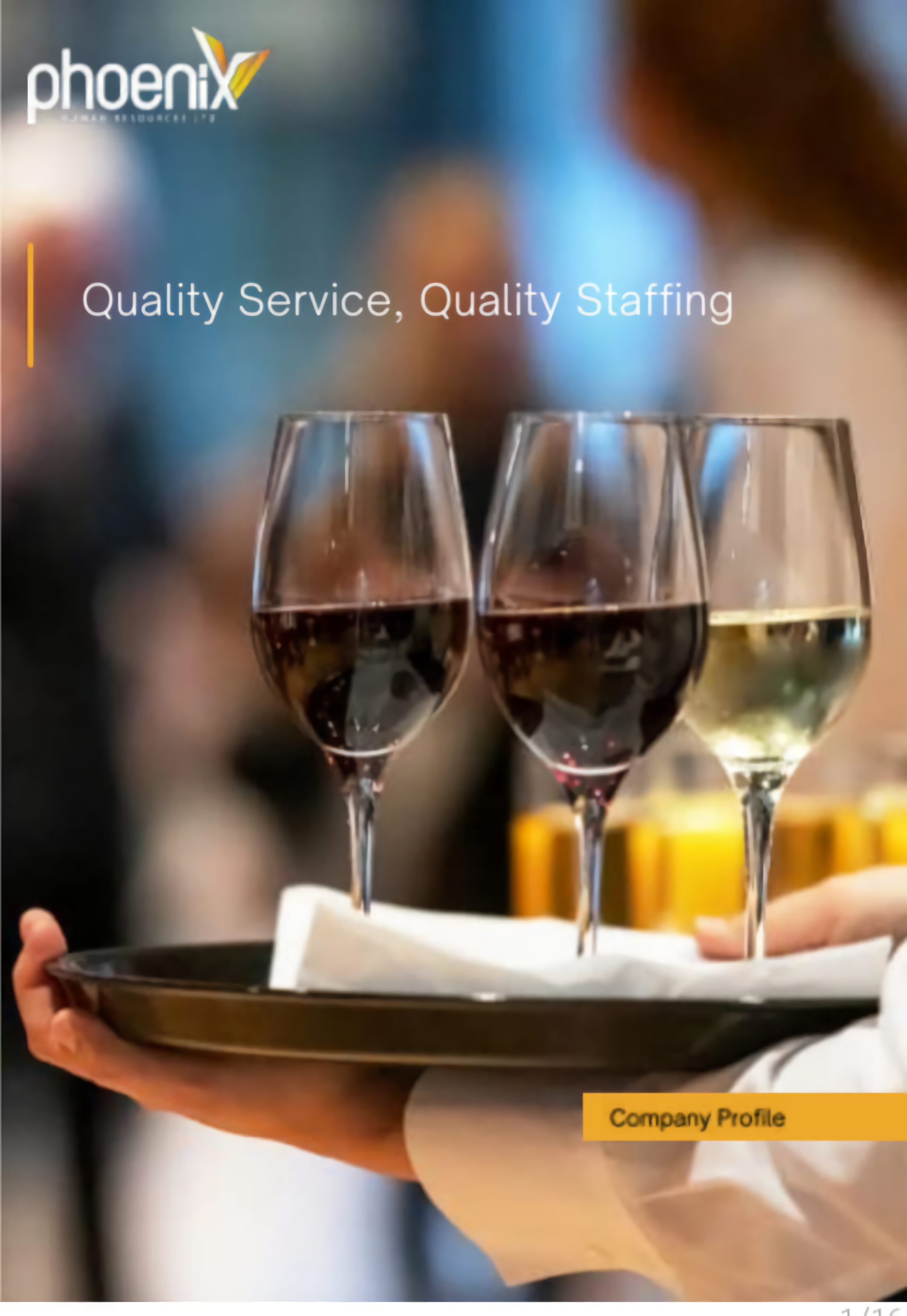 A polished tray displays three elegant wine glasses—two filled with red and one with white—against a softly blurred, festive backdrop.