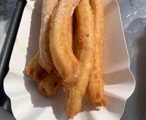 Authentic Spanish Churros Served with Chocolate Sauce