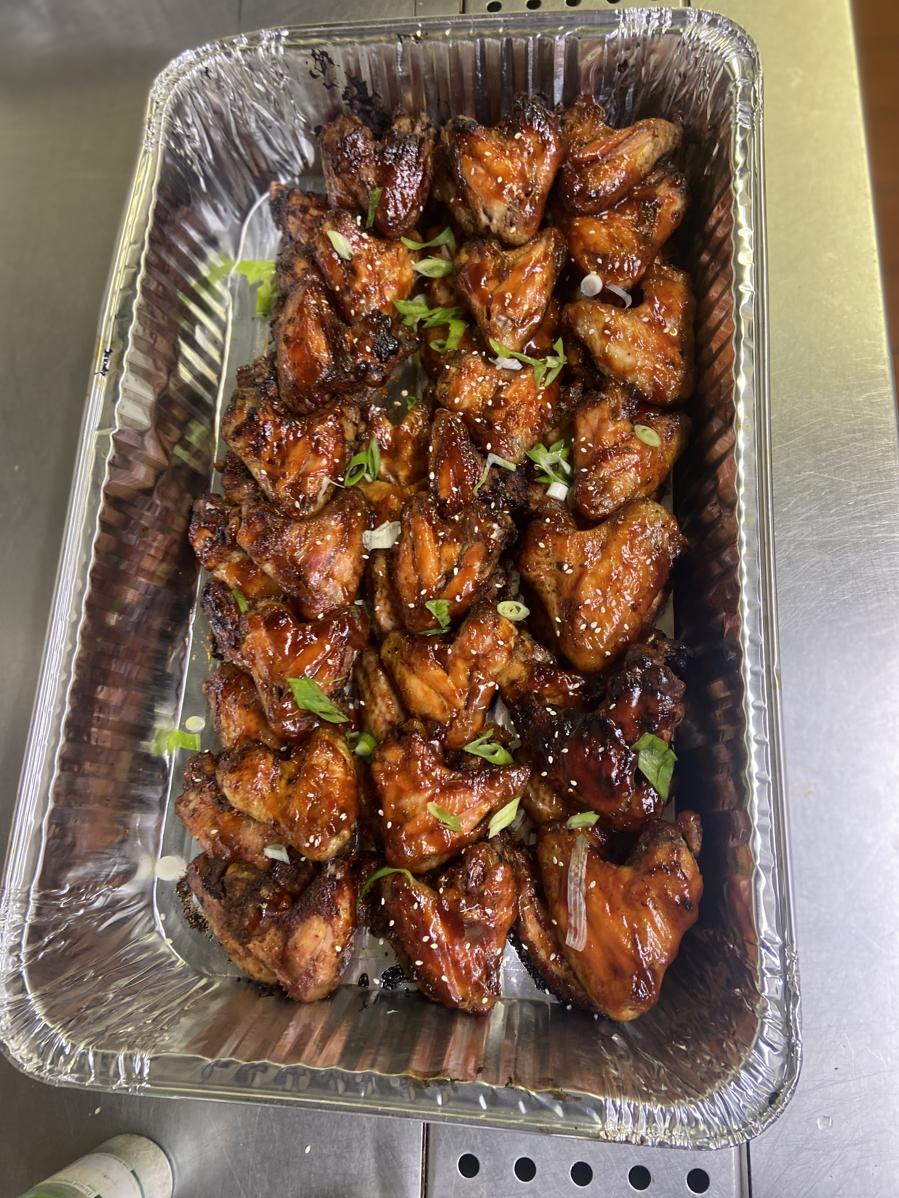 Tender Jerk Wings, Rice & Peas Served Buffet-Style