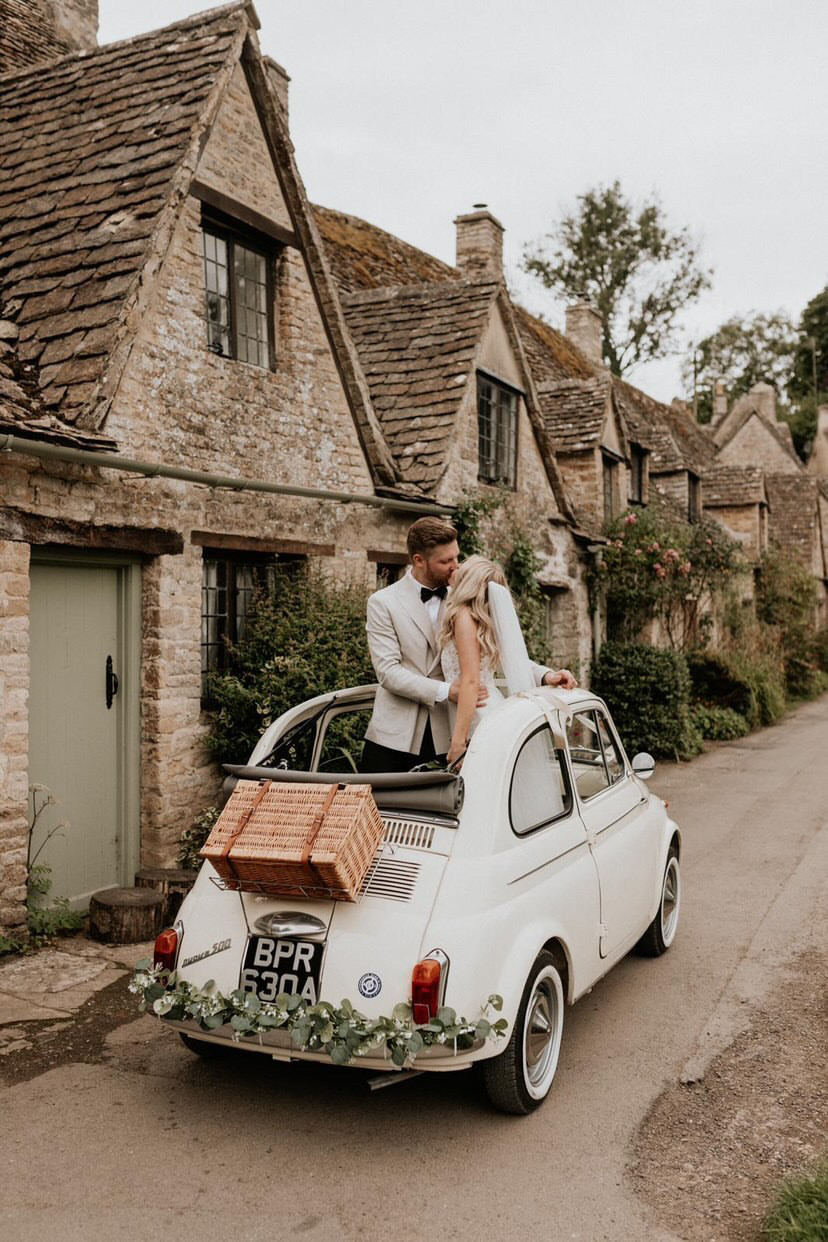 Unique & Stylish Cream Vintage Fiat 500 Car