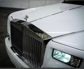 White Rolls Royce Phantom with Star Lights