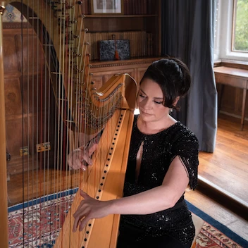 Sophia The Singing Harpist