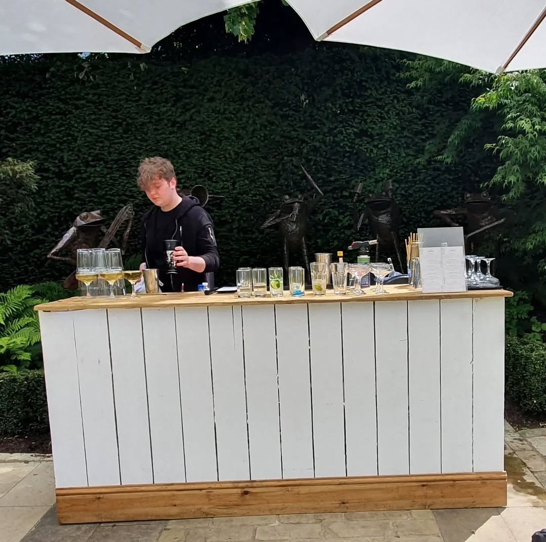 White Wooden Bar with Unlimited Cocktails