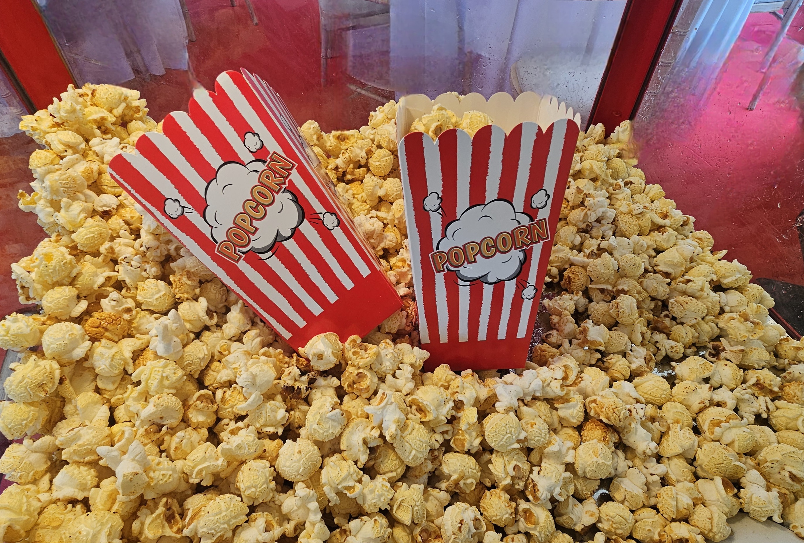 Popcorn Cart serving Delicious, Mouth-Watering Popcorn
