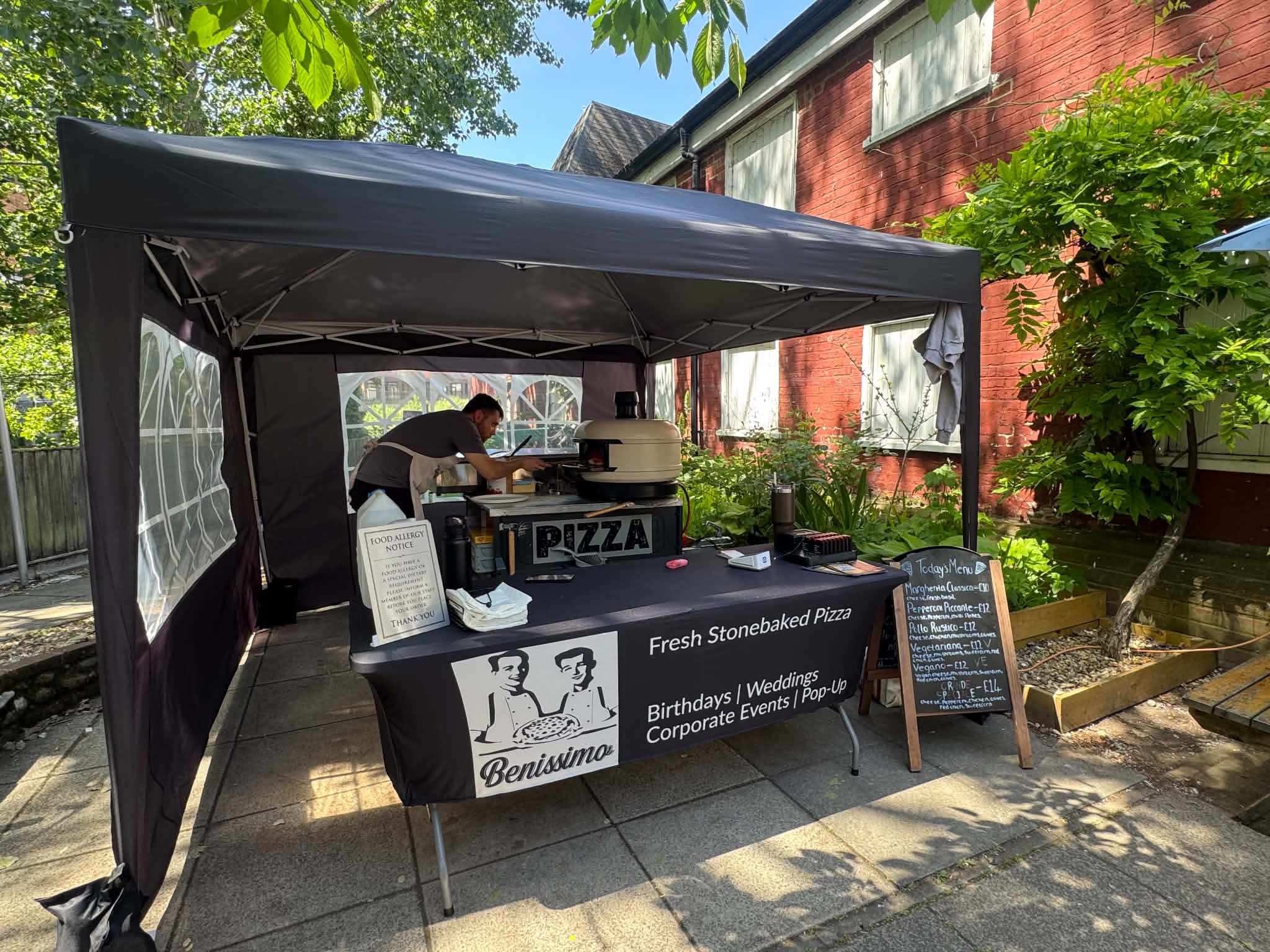 Stone-Baked Pizza Served Fresh from a Mini Pizza Trailer