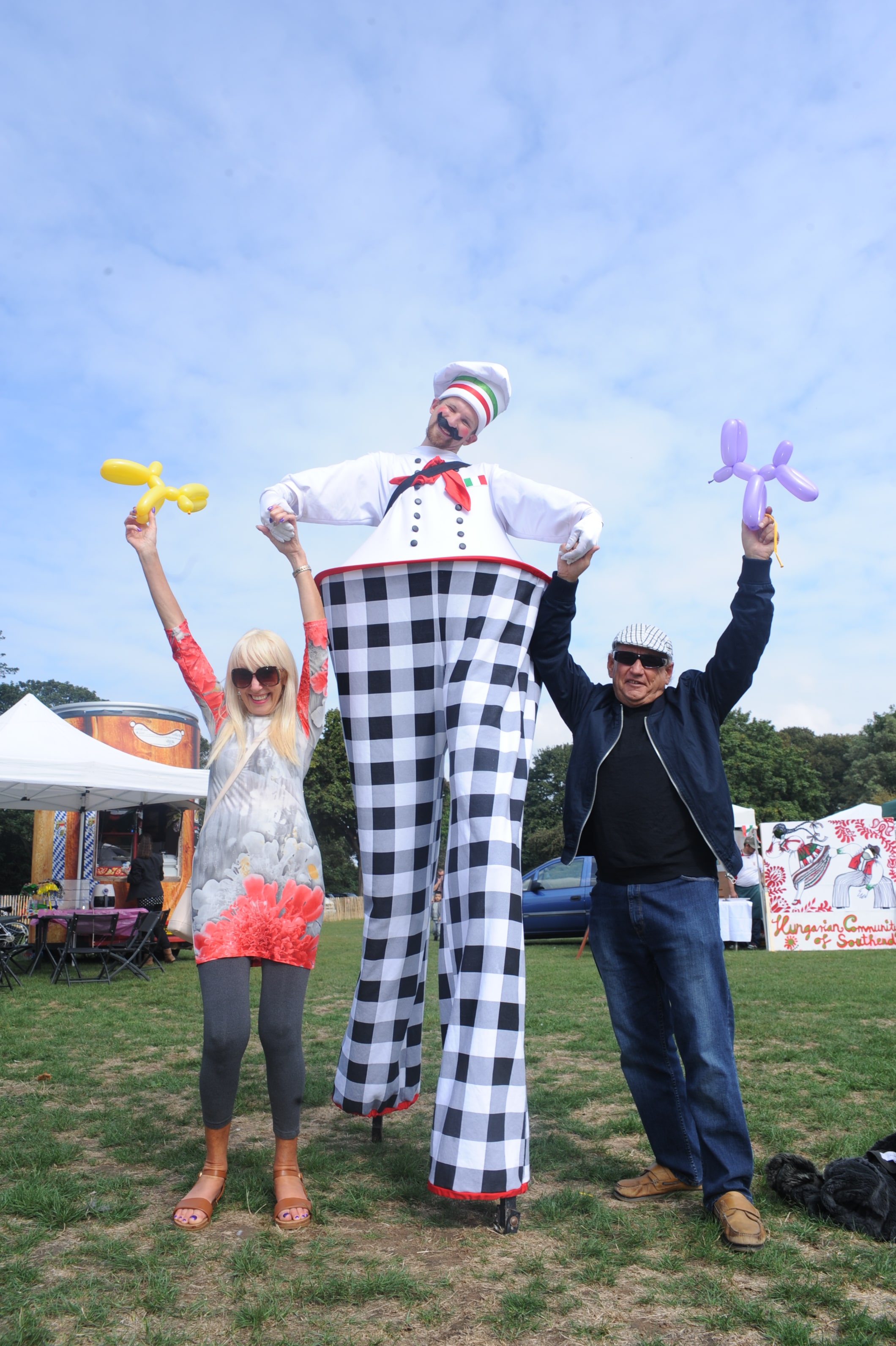 A Professional Stilt Walker Who Truly Stands Above the Crowd