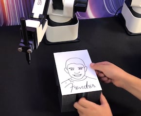Extraordinary Robot Arms Caricaturist Creating a Talking Point