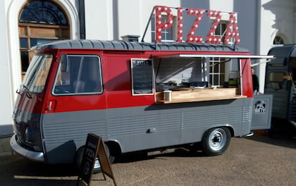 Sourdough Pizzas Freshly Cooked in a Vintage Food Truck