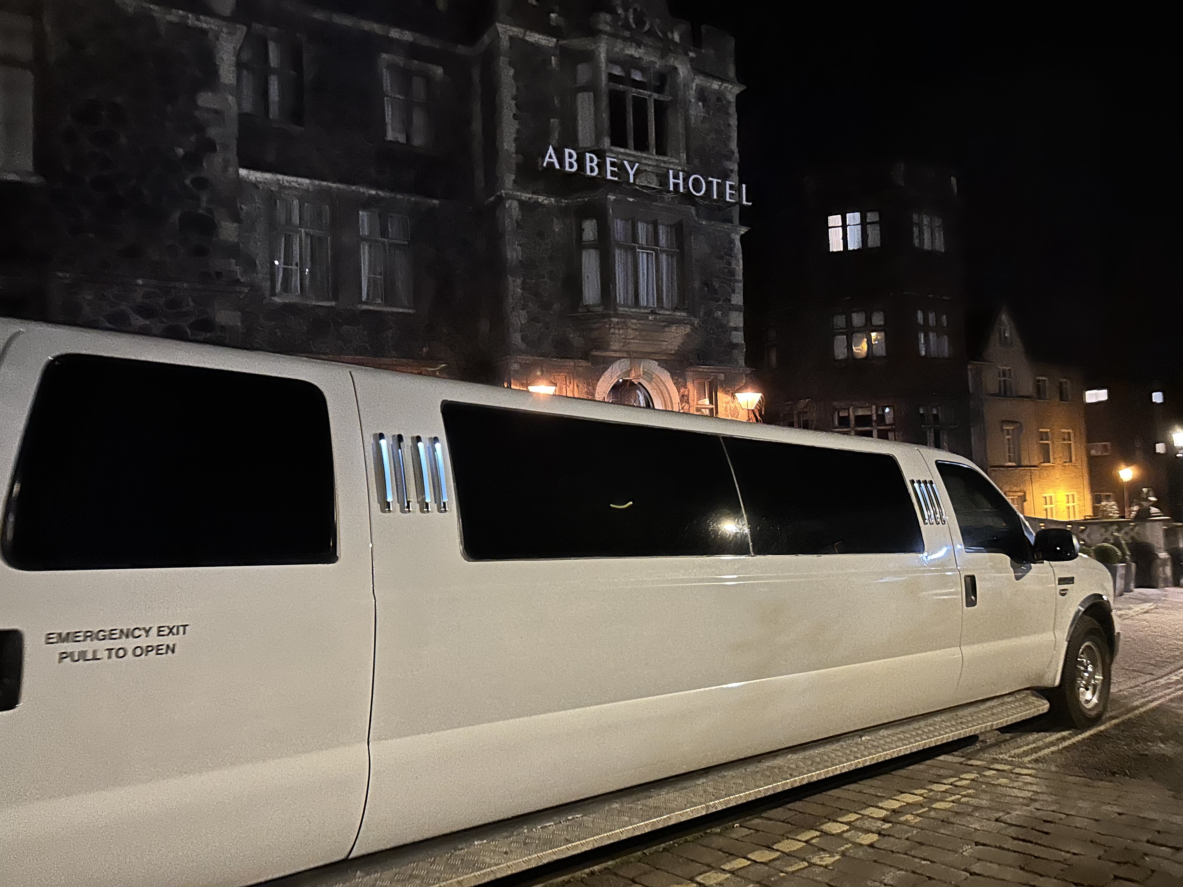 13 Seater White Limo Jeep