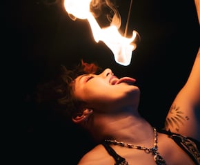 Small Scale Fire Show Exhibiting Fire Eating, Body Burning & Poi