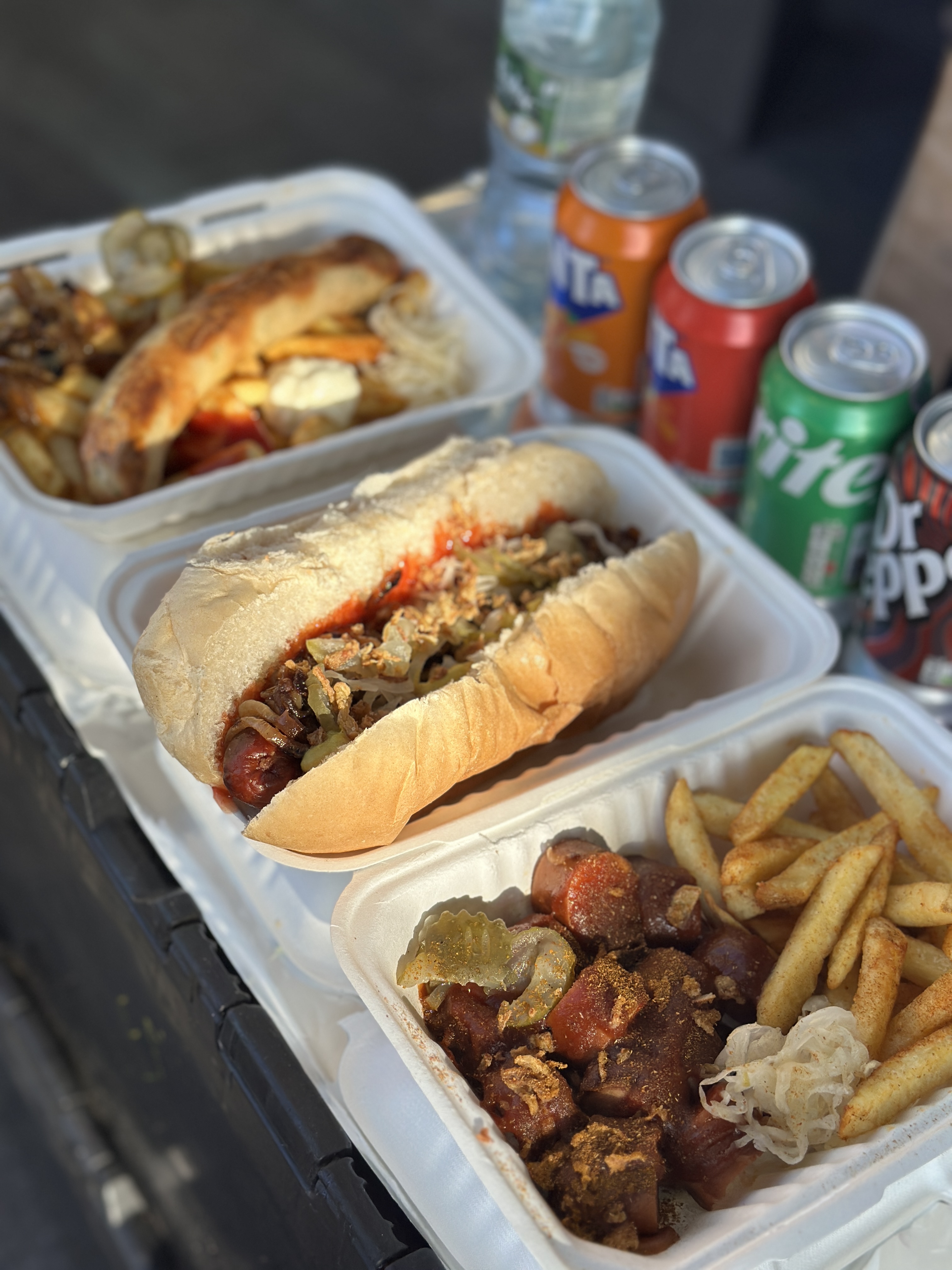 Juicy, Smoky Bratwursts Fresh Off the Grill with Loaded Toppings & Fries