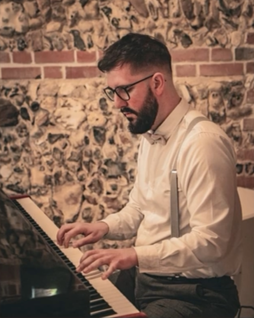 Adam Playing Live Piano to Create the Perfect Atmosphere