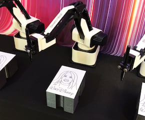 Extraordinary Robot Arms Caricaturist Creating a Talking Point