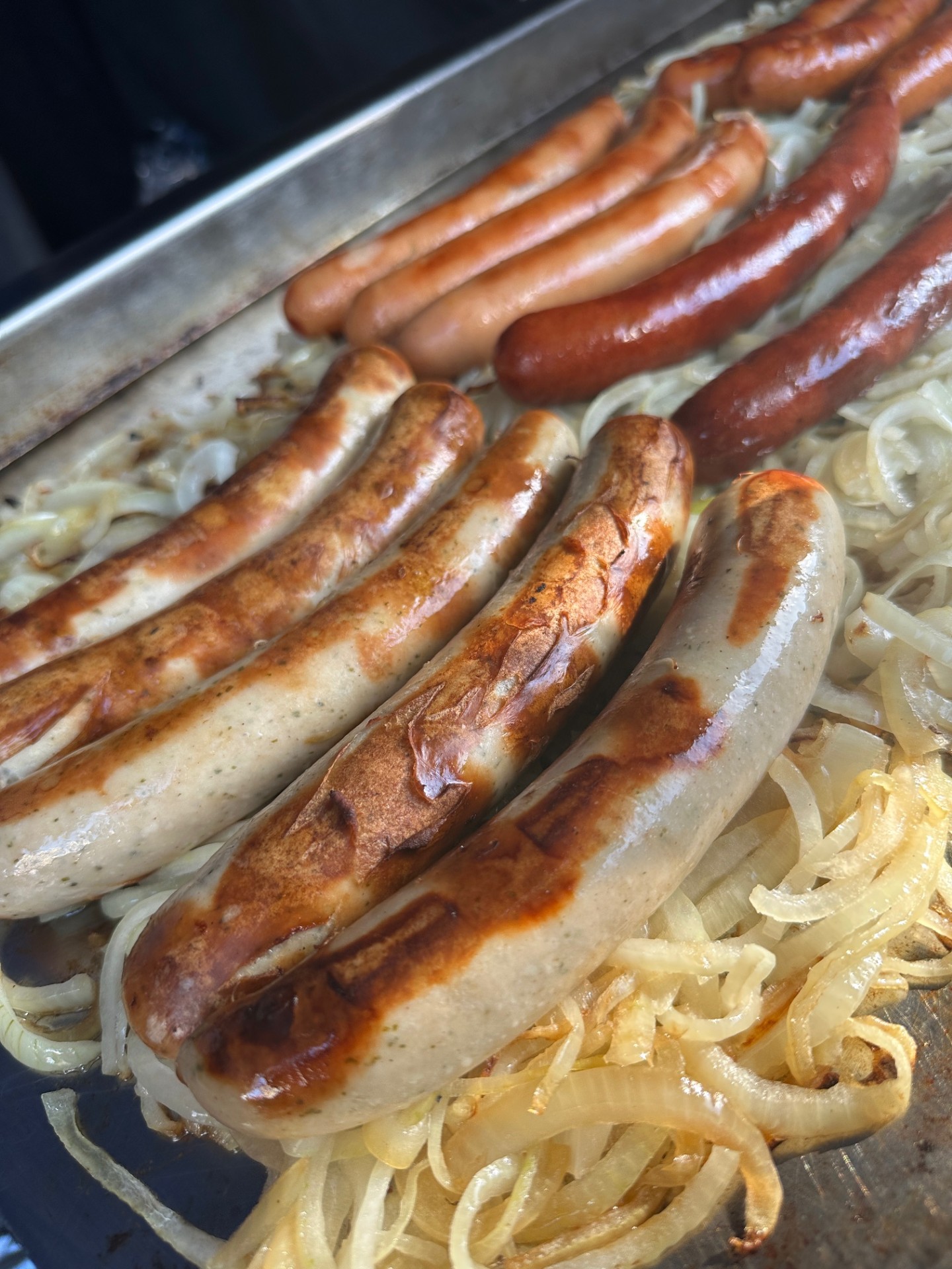 Juicy, Smoky Bratwursts Fresh Off the Grill with Loaded Toppings & Fries