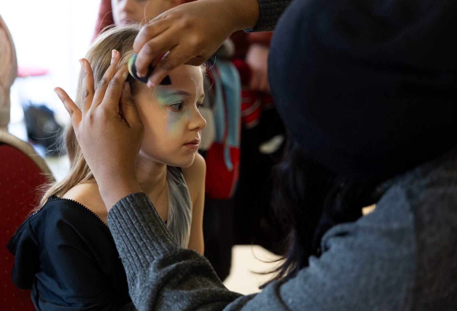 Vibrant & Glittery Face Painting