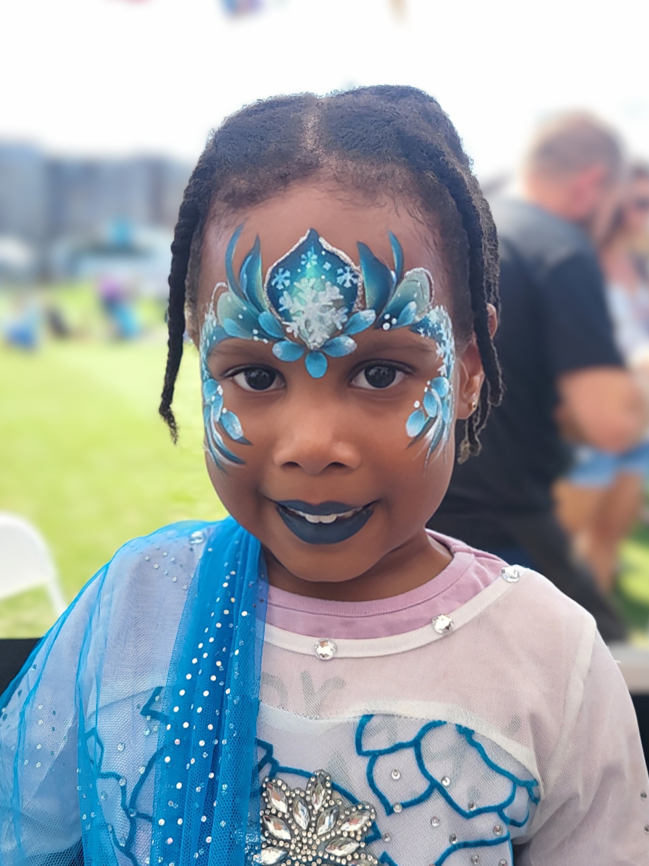 Vibrant & Enchanting Face Painting & Glitter