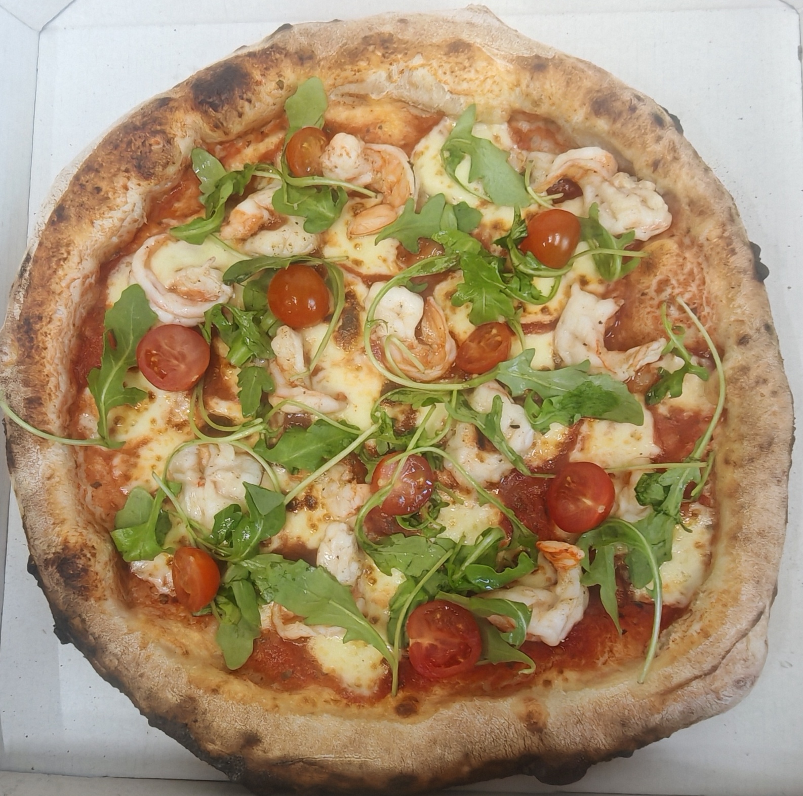 Authentic Wood-Fired Neapolitan Pizza Served Fresh