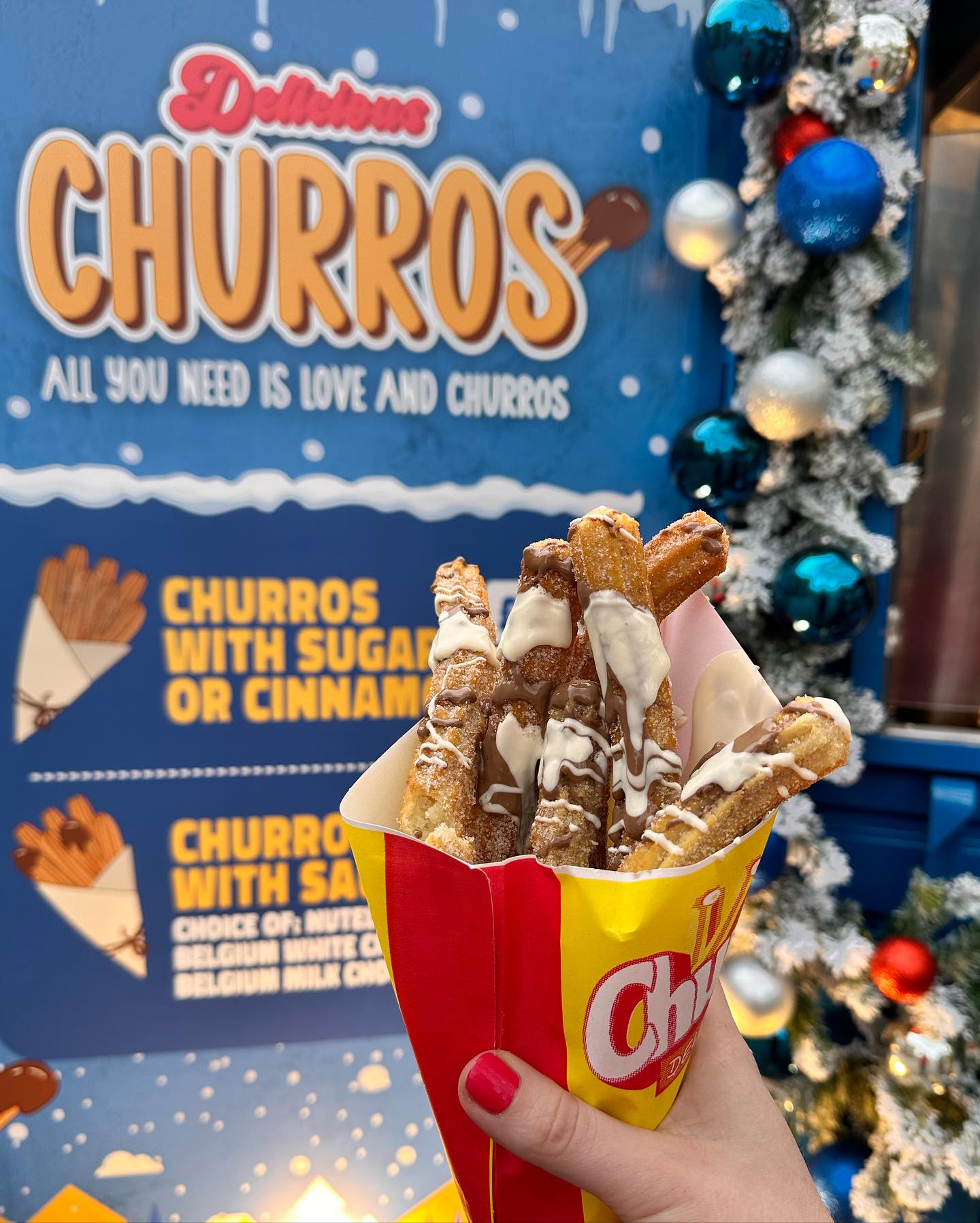 The Little Blue Box Serving Unlimited Spanish Churros