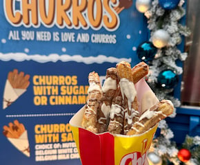 The Little Blue Box Serving Unlimited Spanish Churros
