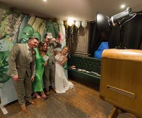 Open Photo Booth with a Vast Selection of Props & Decor