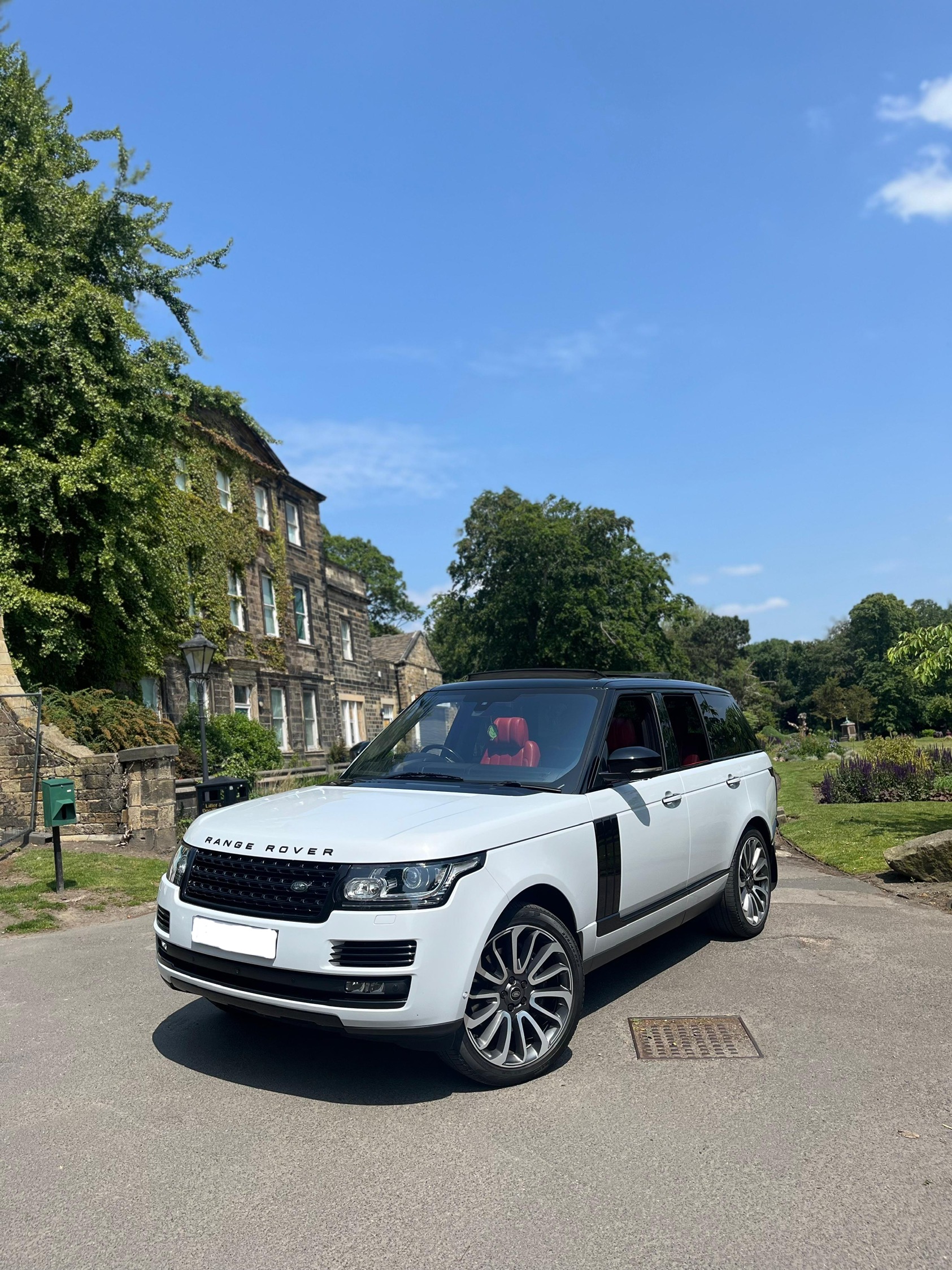 White Range Rover Vogue with Red Interior