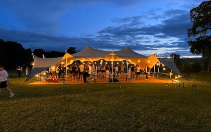 Medium Sized 15m x 10.5m Stretch Tent with Lighting and Flooring
