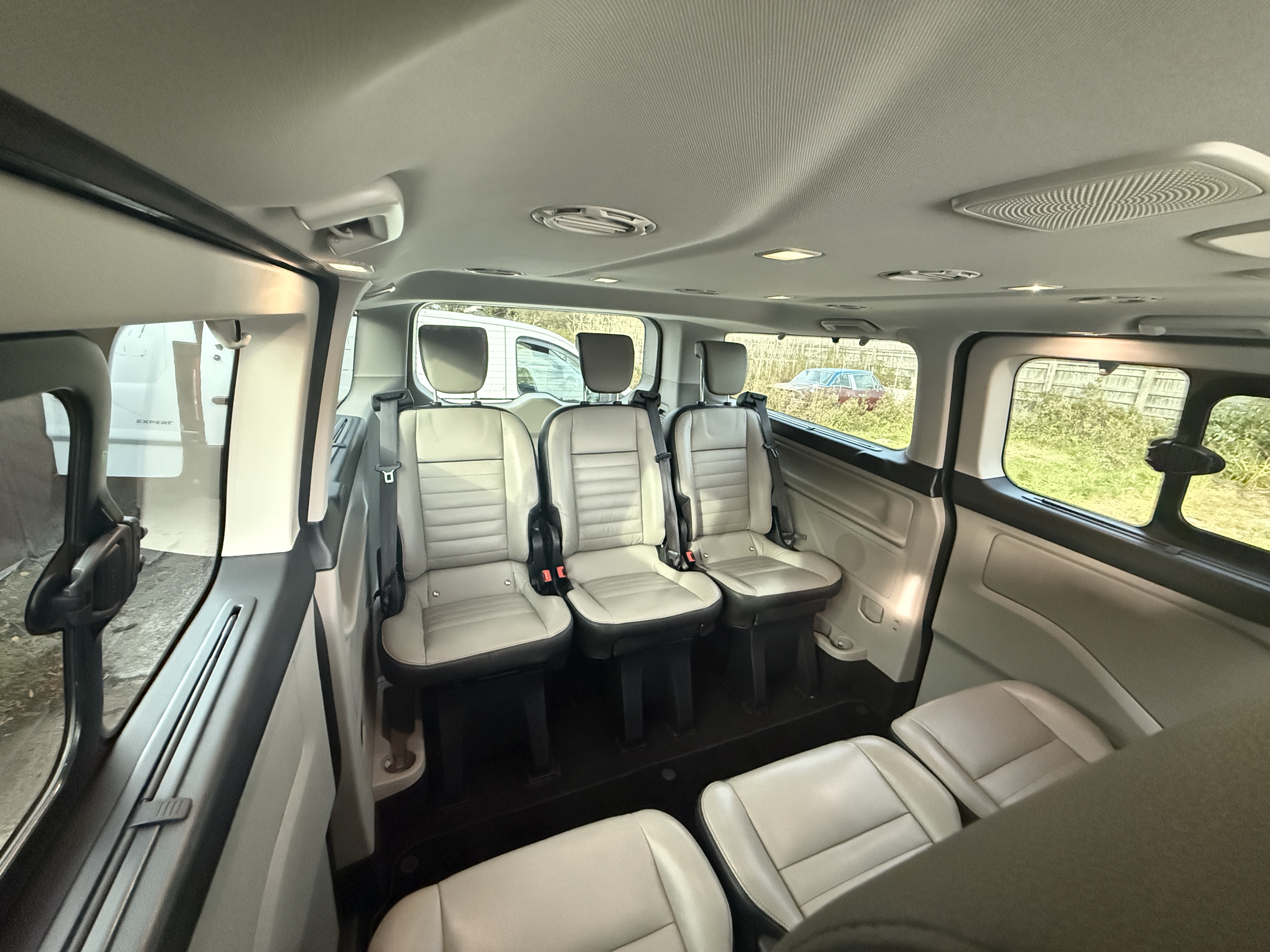 8-Passenger Luxury Minibus with Starlight Ceiling & TV