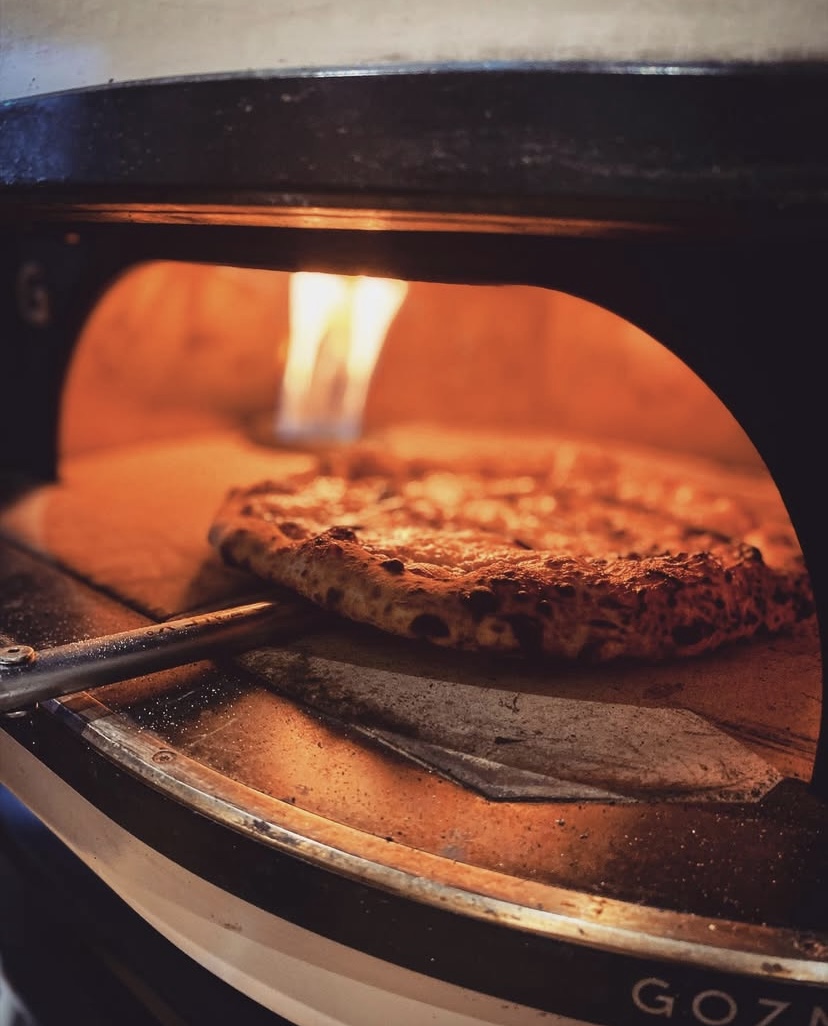 Hand-Stretched Spanish Influenced Pizza For Your Event