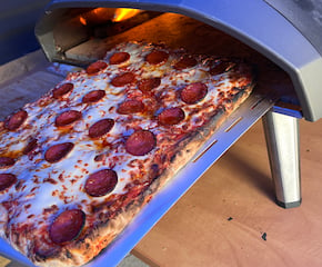 Stone-Baked Sliced Pizza Served Buffet Style on Catering Tricycle