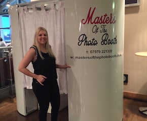 White Gloss Enclosed Photo Booth with a Guest Book