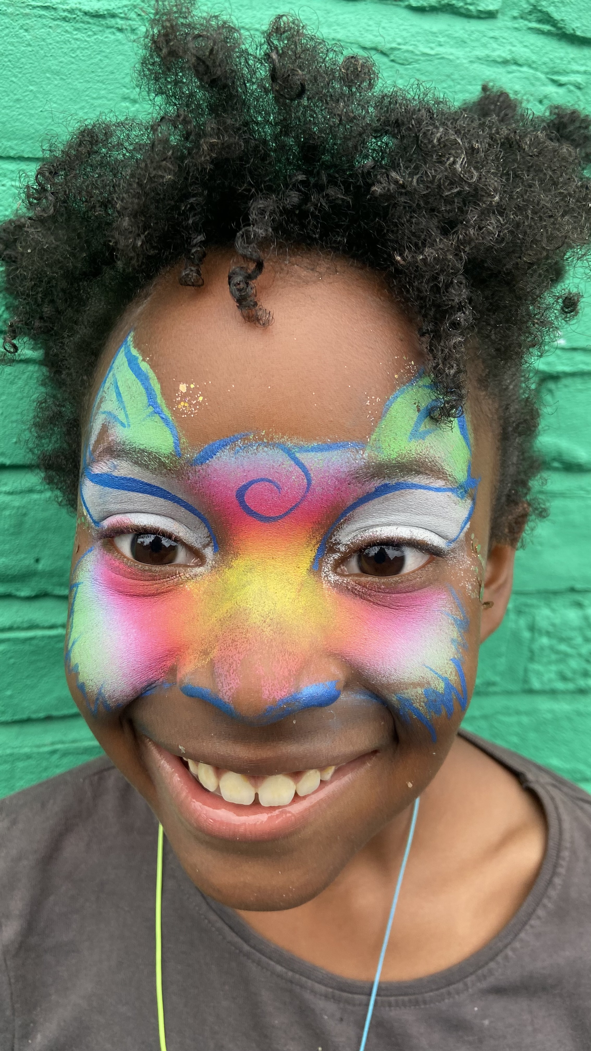 Vibrant & Glittery Face Painting