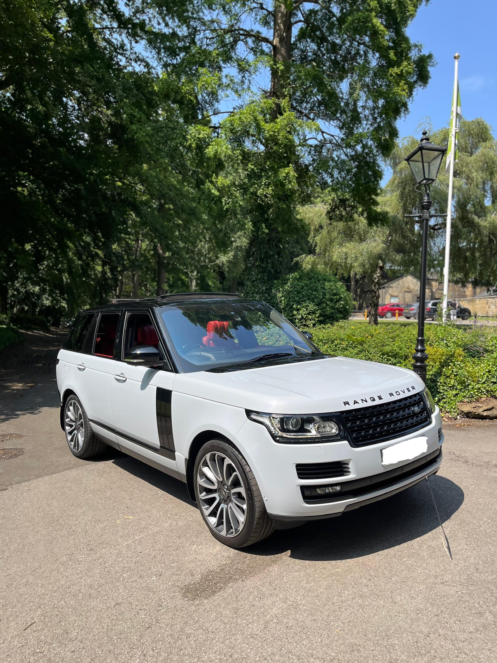 White Range Rover Vogue with Red Interior