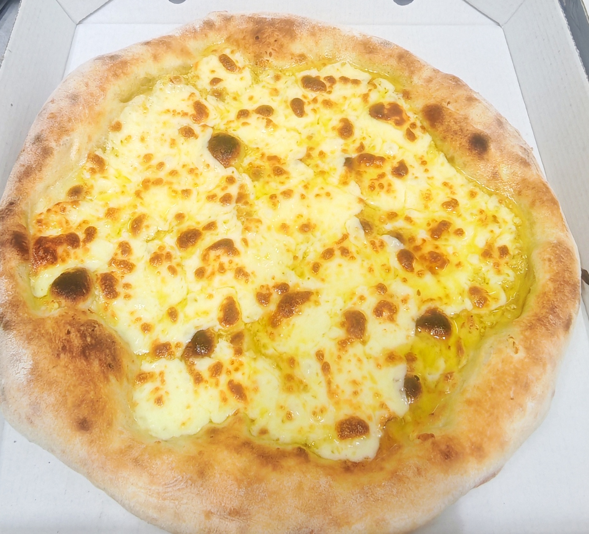 Authentic Wood-Fired Neapolitan Pizza Served Fresh