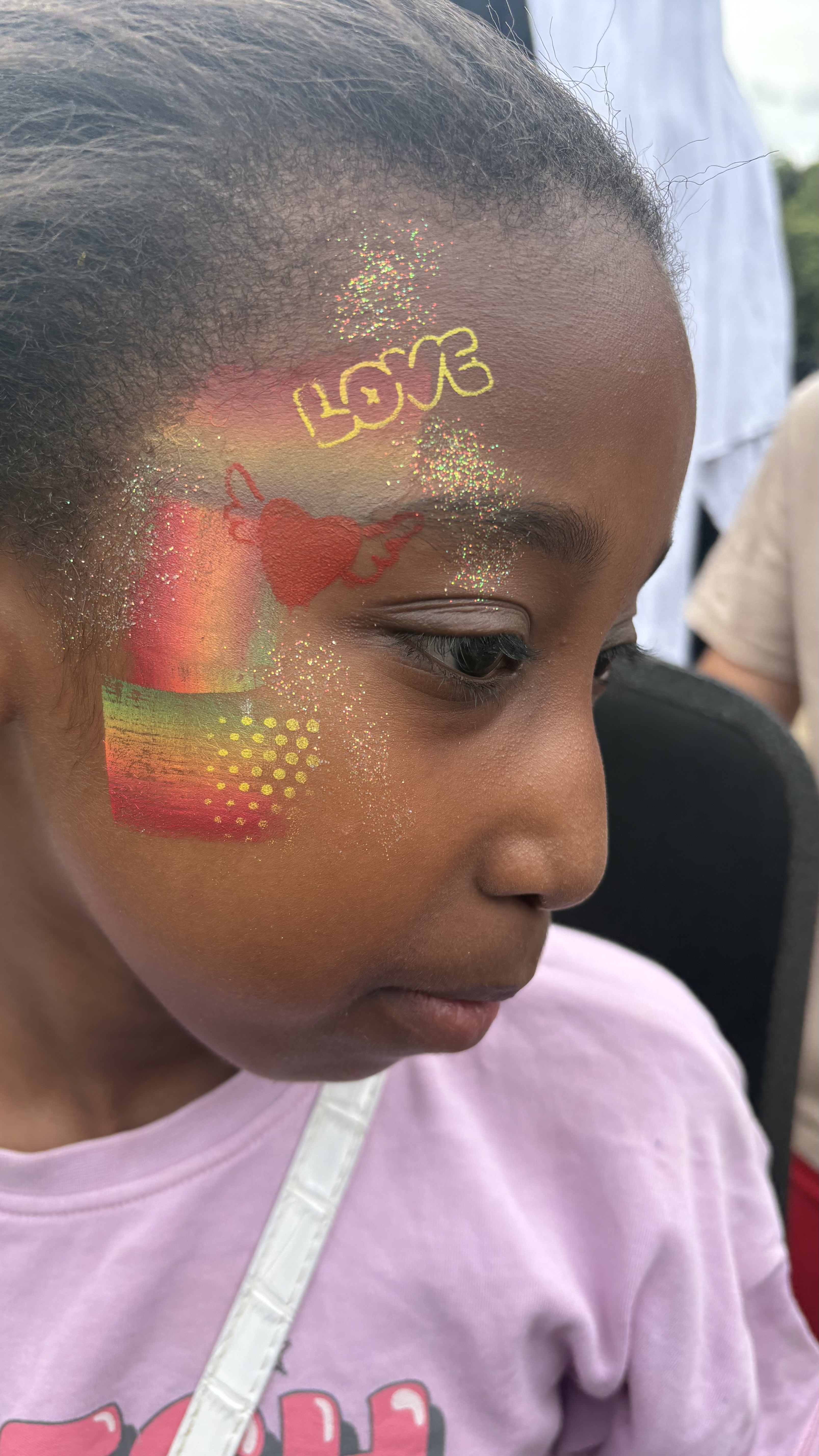 Vibrant & Glittery Face Painting