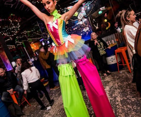 Highly-Skilled Towering Stilt Walkers With Bespoke Costuming