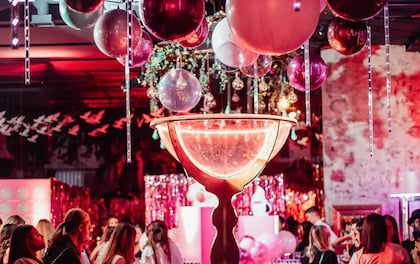 Giant Martini Glass with Performer Impressing Guests with Acrobatic Grace