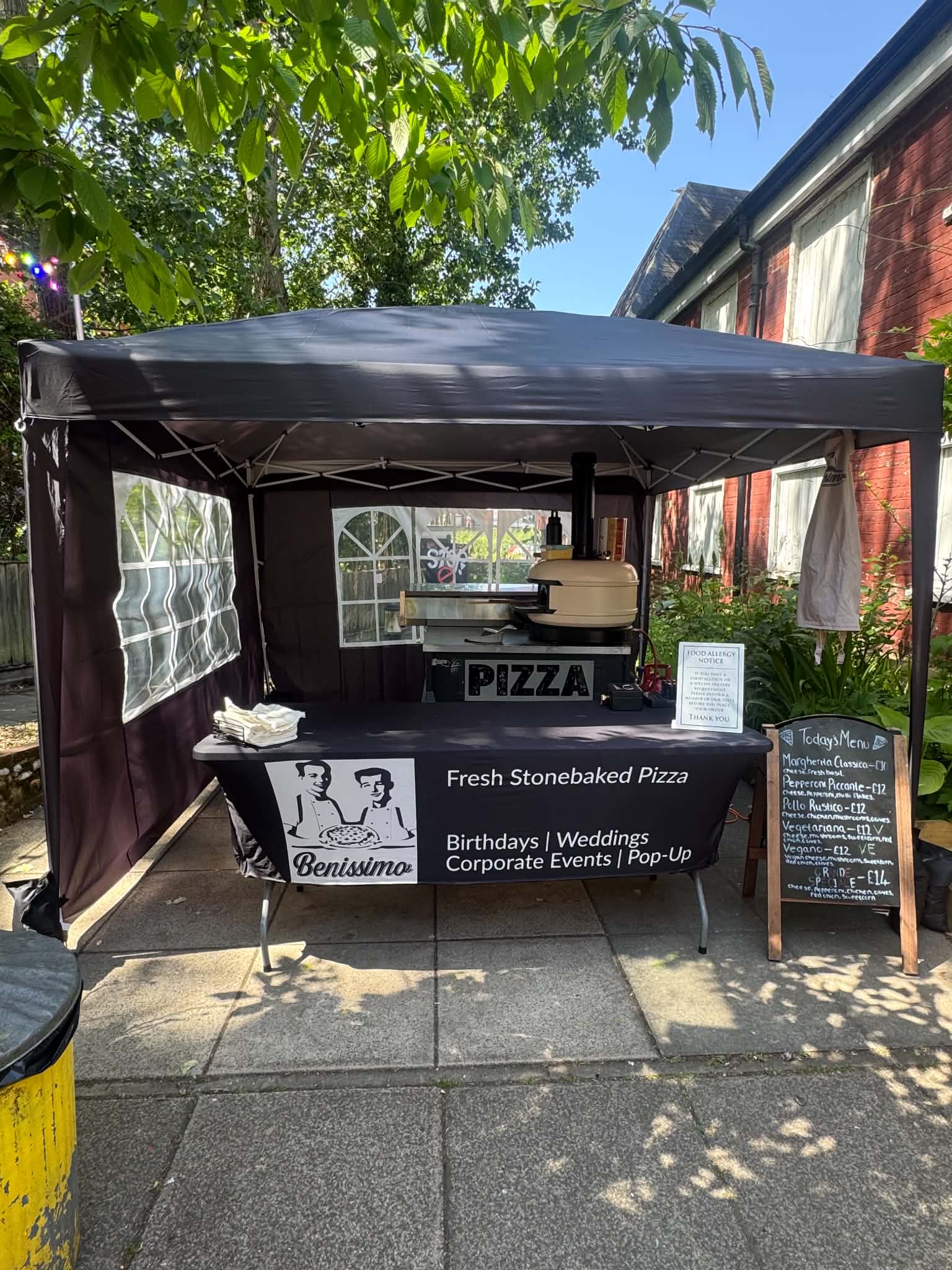 Stone-Baked Pizza Served Fresh from a Mini Pizza Trailer
