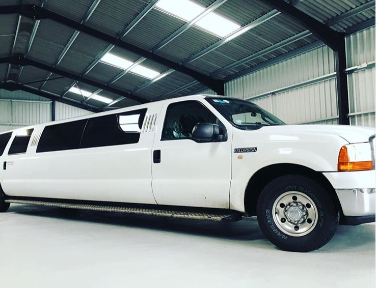 13 Seater White Limo Jeep
