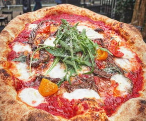 Elevate Your Event with the Irresistible Taste of Wood-Fired Pizza