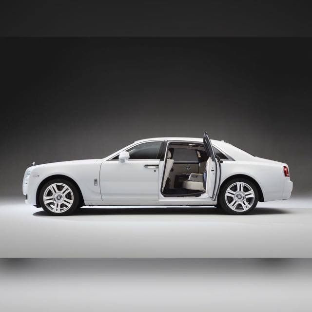 Rolls Royce with Well-Dressed Chauffeurs