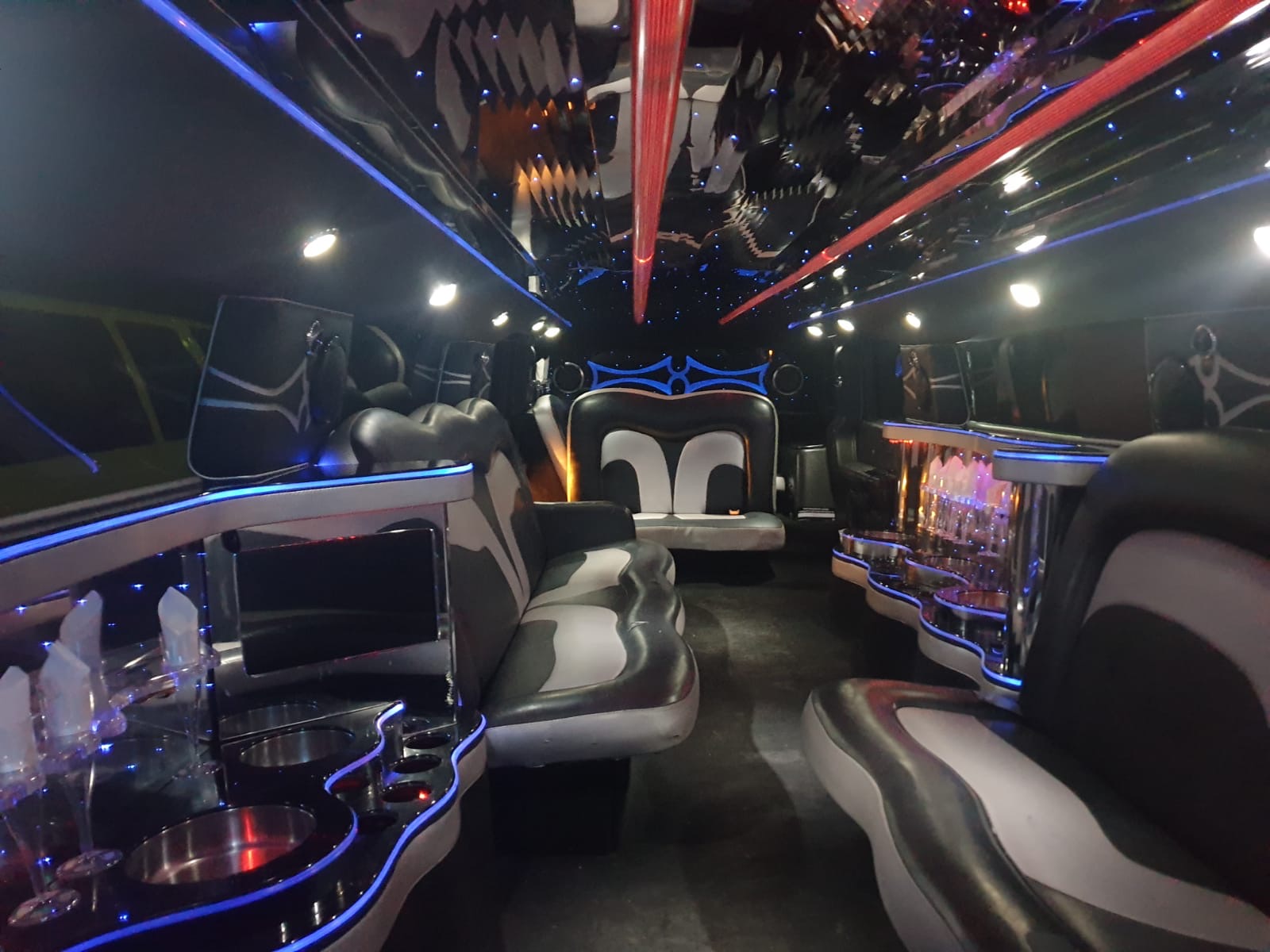 Unique, White 16 Passengers Hummer H2