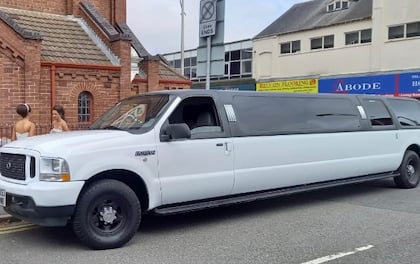 Arrive In Style In Gorgeous Dazzling White   13 -Seater Limo