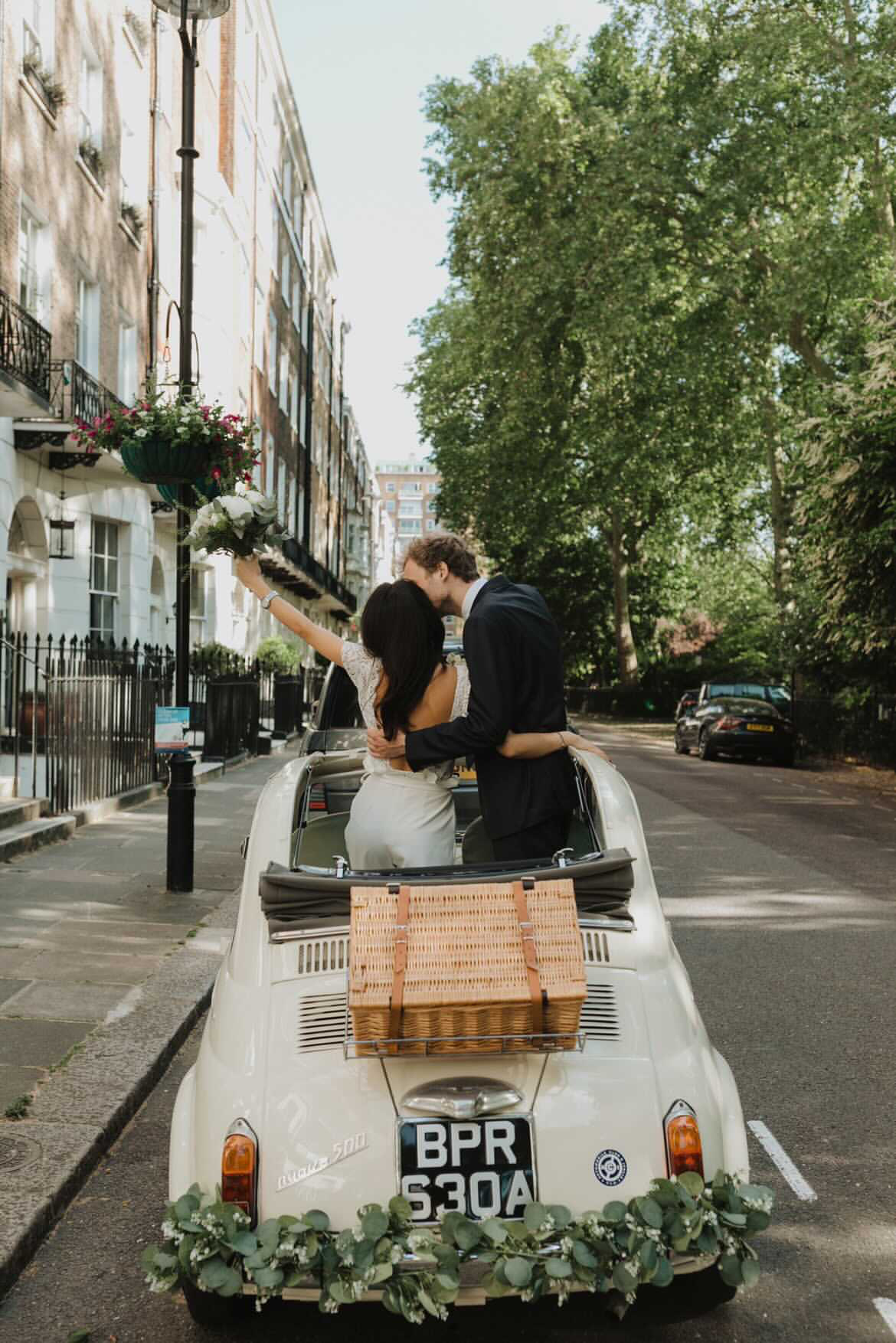 Unique & Stylish Cream Vintage Fiat 500 Car