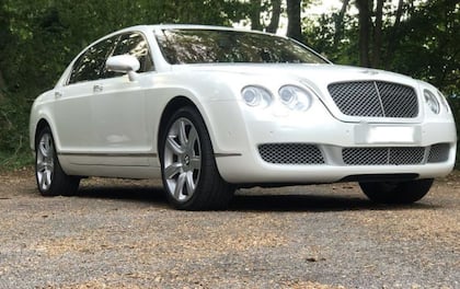 Elegance in Motion: White Bentley Flying Spur for Your Special Event