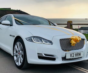 Arrive in Luxury in Our Beautiful White Jaguar XJ