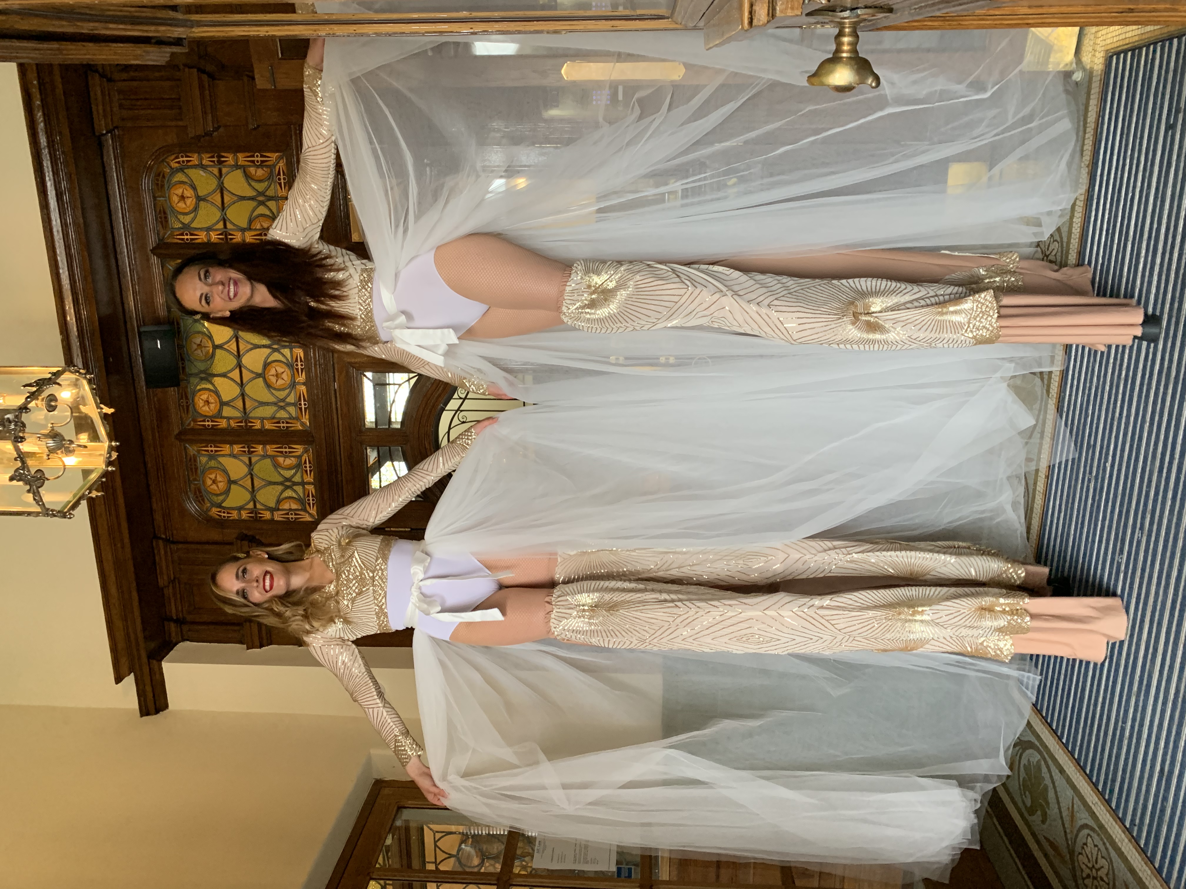 Wow Your Guests With An Unexpected Meet And Greet Of Stilt Walkers