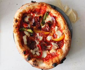 Wood-Fired Pizza Out Of Our One-of-a-kind Vintage Horse Trailer