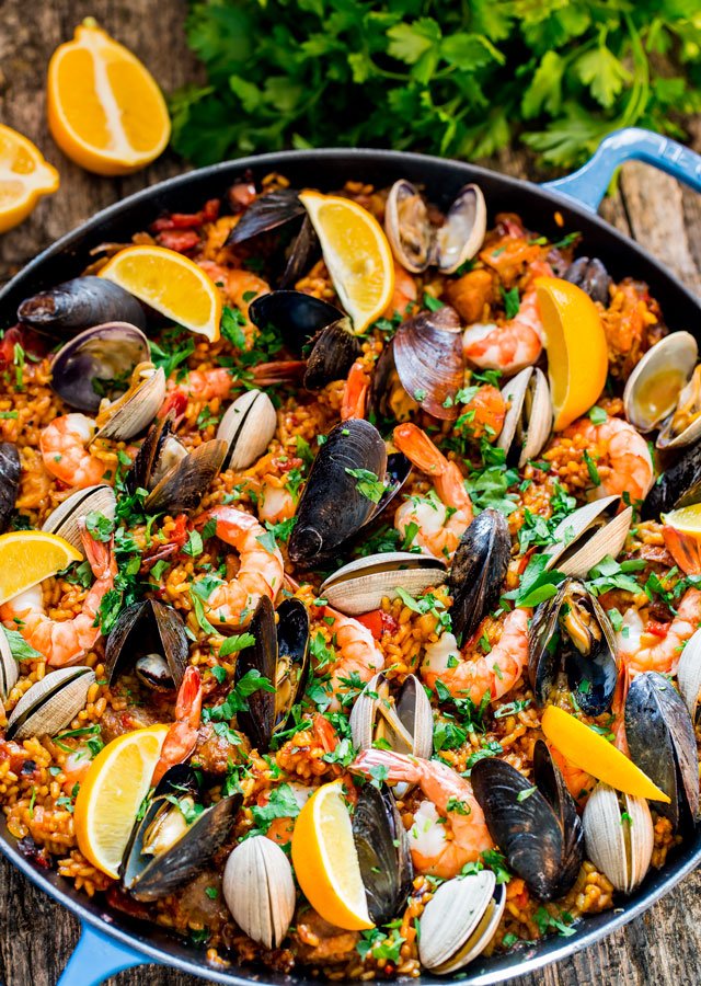 Paella and Cold Tapas Dishes with Glass of Organic Cava