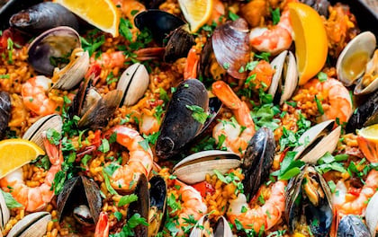 Paella and Cold Tapas Dishes with Glass of Organic Cava